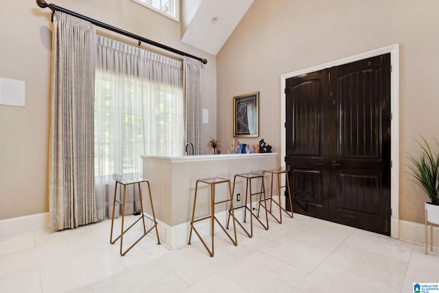 2821 Shook Hill Cir, Mountain Brook, AL 35223 - entrance foyer featuring a high ceiling and baseboards