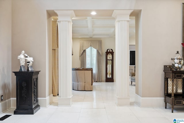 2821 Shook Hill Cir, Mountain Brook, AL 35223 - hallway with ornate columns, coffered ceiling, beam ceiling, tile patterned flooring, and baseboards
