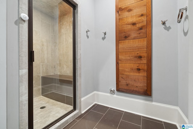 2821 Shook Hill Cir, Mountain Brook, AL 35223 - bathroom featuring a stall shower, tile patterned flooring, and baseboards