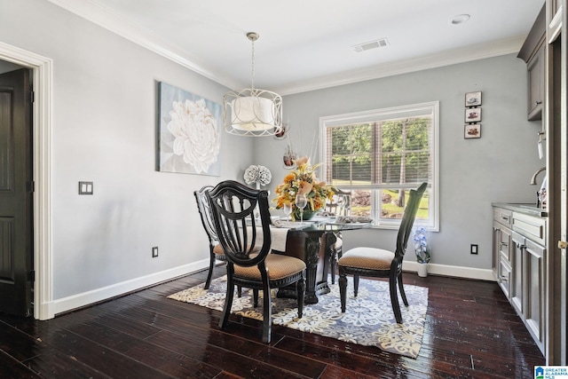 2821 Shook Hill Cir, Mountain Brook, AL 35223 - dining area with ornamental molding, baseboards, and dark wood-style floors