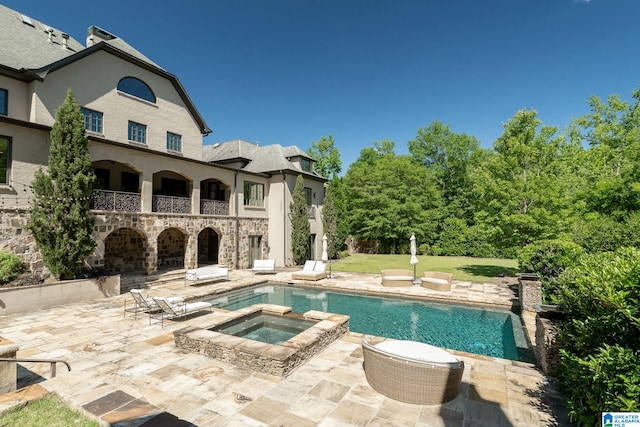 2821 Shook Hill Cir, Mountain Brook, AL 35223 - view of pool featuring a patio and a pool with connected hot tub