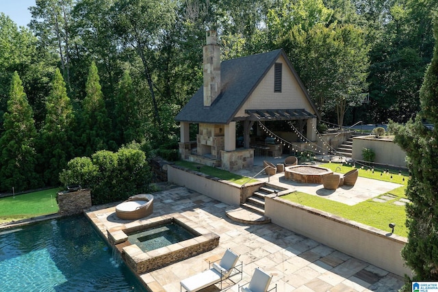 2821 Shook Hill Cir, Mountain Brook, AL 35223 - rear view of property with a fire pit, a patio area, an in-ground hot tub, an outdoor pool, and a chimney