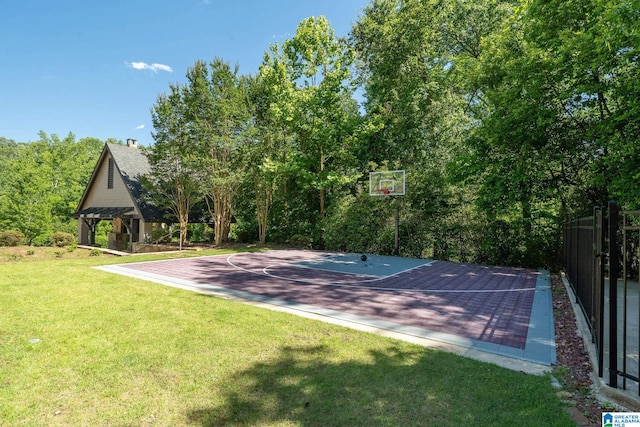 2821 Shook Hill Cir, Mountain Brook, AL 35223 - view of basketball court featuring basketball hoop and a lawn