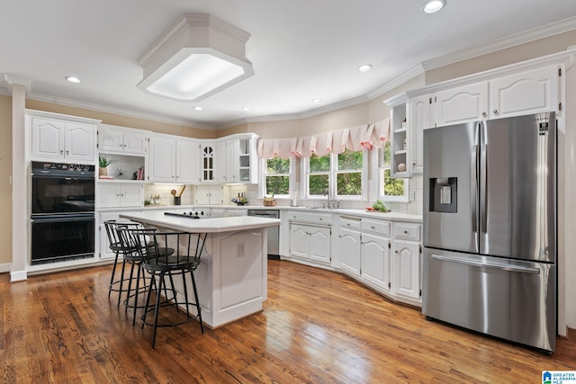2100 Southwinds Cir, Hoover, AL 35244 - kitchen featuring open shelves, black appliances, white cabinetry, recessed lighting, and crown molding