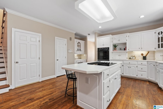 2100 Southwinds Cir, Hoover, AL 35244 - kitchen with black appliances, open shelves, white cabinets, dark wood-style floors, and ornamental molding
