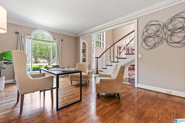 2100 Southwinds Cir, Hoover, AL 35244 - dining space with ornamental molding, stairway, plenty of natural light, baseboards, and wood finished floors