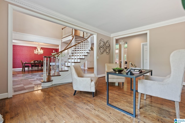 2100 Southwinds Cir, Hoover, AL 35244 - living area with a chandelier, stairway, crown molding, wood finished floors, and baseboards