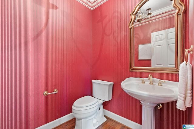 2100 Southwinds Cir, Hoover, AL 35244 - half bathroom with wood finished floors, toilet, and baseboards