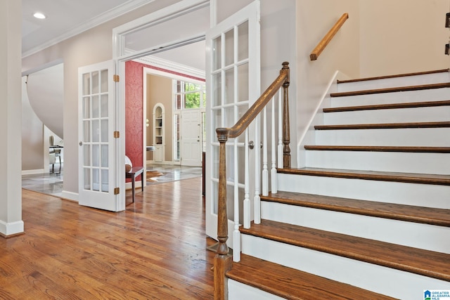 2100 Southwinds Cir, Hoover, AL 35244 - stairs featuring ornamental molding, baseboards, wood finished floors, french doors, and recessed lighting