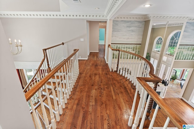 2100 Southwinds Cir, Hoover, AL 35244 - hall with an upstairs landing, plenty of natural light, wood finished floors, a chandelier, and recessed lighting