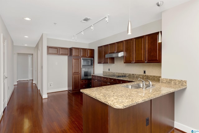 2024 2nd Ave N Unit 1703, Birmingham, AL 35203 - kitchen featuring a sink, dark wood finished floors, under cabinet range hood, black electric stovetop, and stainless steel microwave