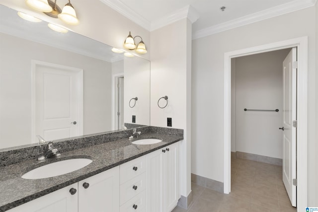 2024 2nd Ave N Unit 1703, Birmingham, AL 35203 - full bathroom with double vanity, crown molding, baseboards, and tile patterned flooring