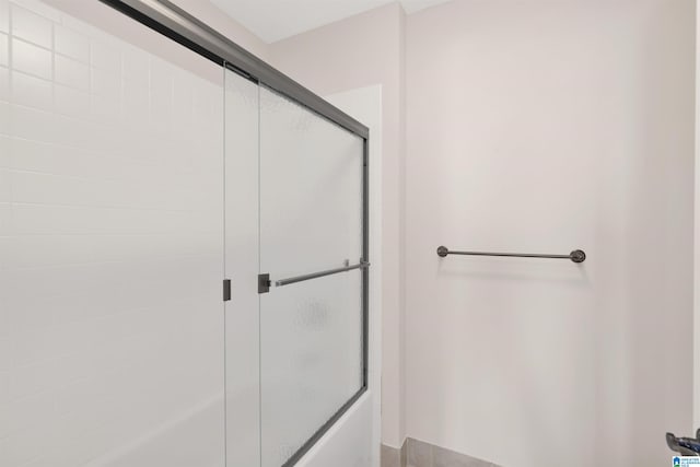 2024 2nd Ave N Unit 1703, Birmingham, AL 35203 - bathroom with combined bath / shower with glass door