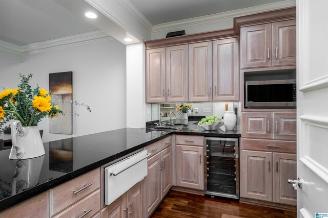 2600 Arlington Ave Unit 80, Birmingham, AL 35205 - kitchen with wine cooler, a warming drawer, crown molding, stainless steel microwave, and dark wood-type flooring