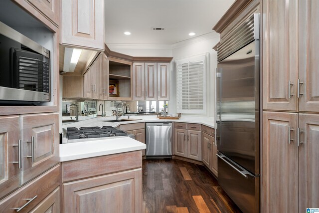 2600 Arlington Ave Unit 80, Birmingham, AL 35205 - kitchen with appliances with stainless steel finishes, crown molding, dark wood finished floors, a sink, and light brown cabinets