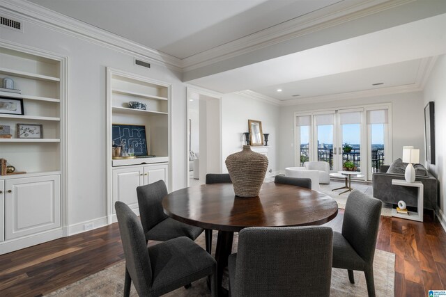 2600 Arlington Ave Unit 80, Birmingham, AL 35205 - dining room with dark wood-style flooring, crown molding, and built in features