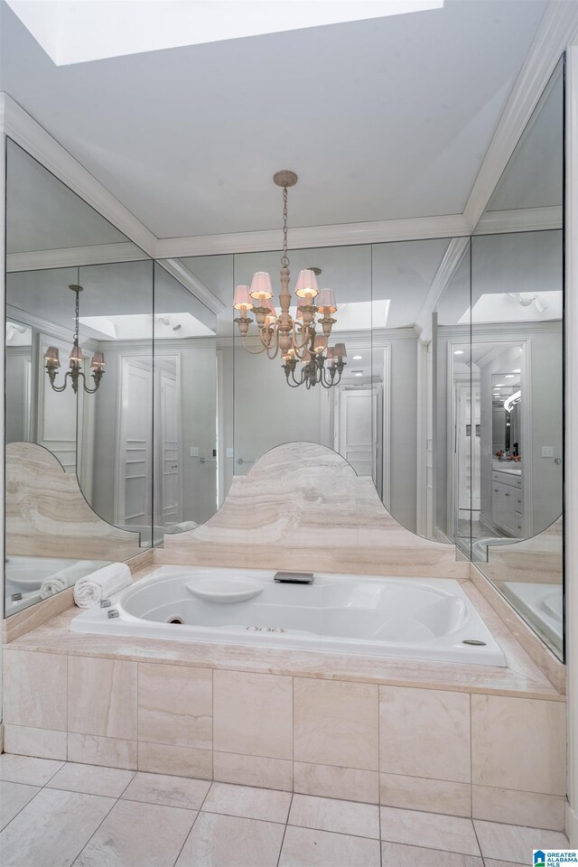 2600 Arlington Ave Unit 80, Birmingham, AL 35205 - bathroom with a chandelier, a garden tub, and tile patterned floors