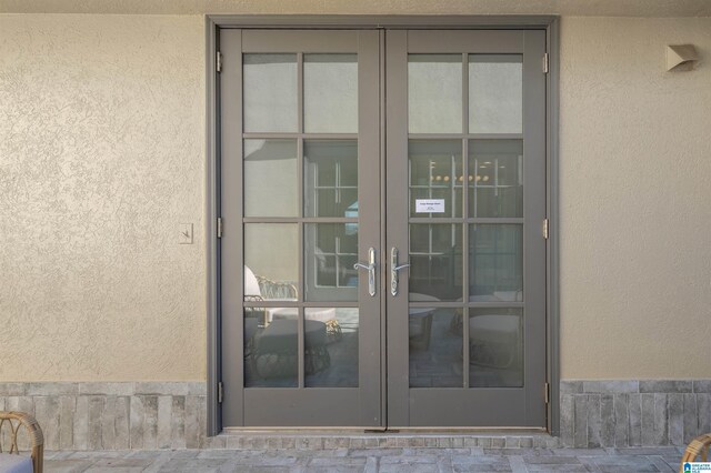 2600 Arlington Ave Unit 80, Birmingham, AL 35205 - view of exterior entry featuring french doors and stucco siding