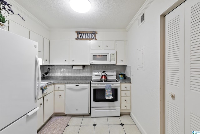2837 Georgetown Dr Unit F, Hoover, AL 35216 - kitchen featuring white appliances, a textured ceiling, crown molding, tasteful backsplash, and white cabinets