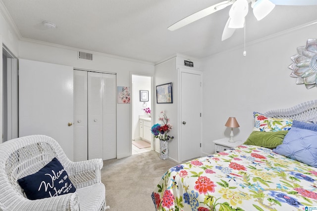 2837 Georgetown Dr Unit F, Hoover, AL 35216 - carpeted bedroom featuring crown molding, ensuite bath, a ceiling fan, and a closet