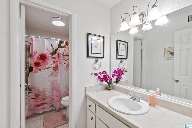2837 Georgetown Dr Unit F, Hoover, AL 35216 - bathroom with vanity, toilet, tile patterned floors, a chandelier, and a shower with curtain