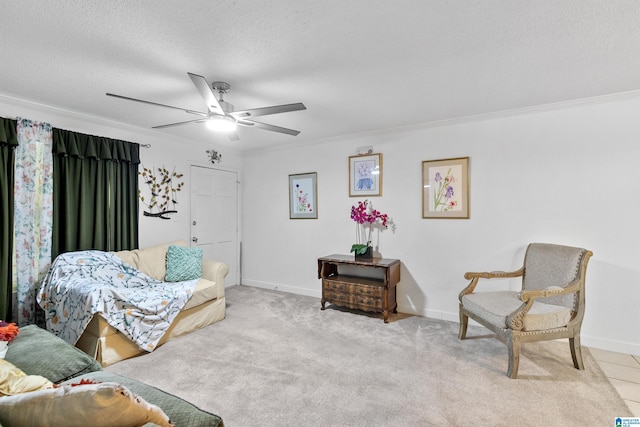 2837 Georgetown Dr Unit F, Hoover, AL 35216 - living area with crown molding, a ceiling fan, a textured ceiling, baseboards, and carpet floors