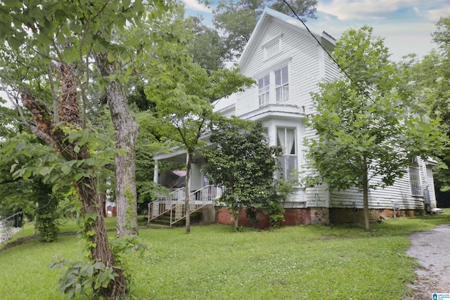 708 5th St NW, Attalla, AL 35954 - view of side of property featuring a yard