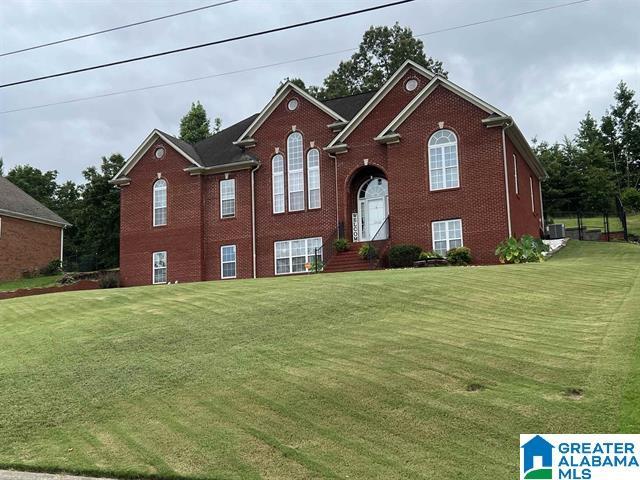 5616 Elliott Cir, Mccalla, AL 35111 - bi-level home featuring brick siding and a front lawn