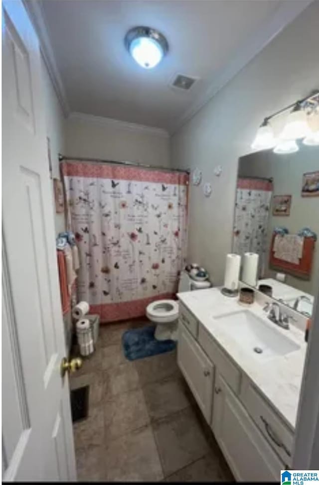 5616 Elliott Cir, Mccalla, AL 35111 - bathroom featuring crown molding, vanity, toilet, and a shower with shower curtain