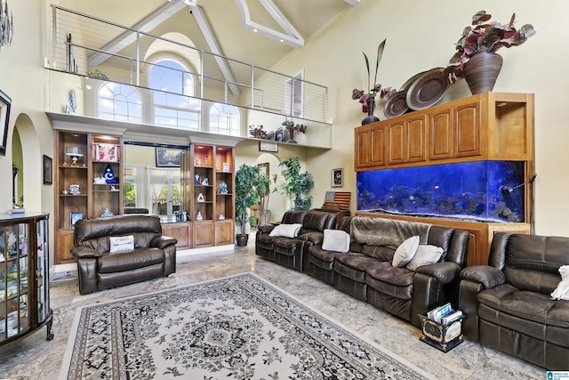 200 Asphodel Dr, Dothan, AL 36303 - living area featuring a towering ceiling, arched walkways, and light marble finish flooring