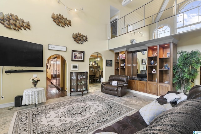 200 Asphodel Dr, Dothan, AL 36303 - living area with arched walkways, a towering ceiling, and marble tiled floors