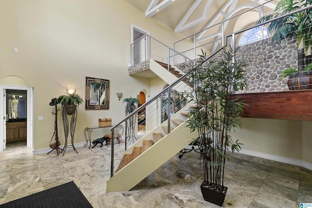 200 Asphodel Dr, Dothan, AL 36303 - staircase with a towering ceiling and stone finish floors