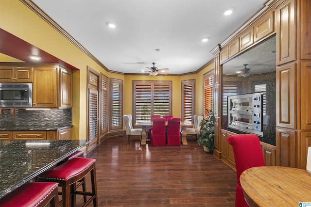 200 Asphodel Dr, Dothan, AL 36303 - dining area with a ceiling fan, crown molding, dark wood-style floors, and recessed lighting