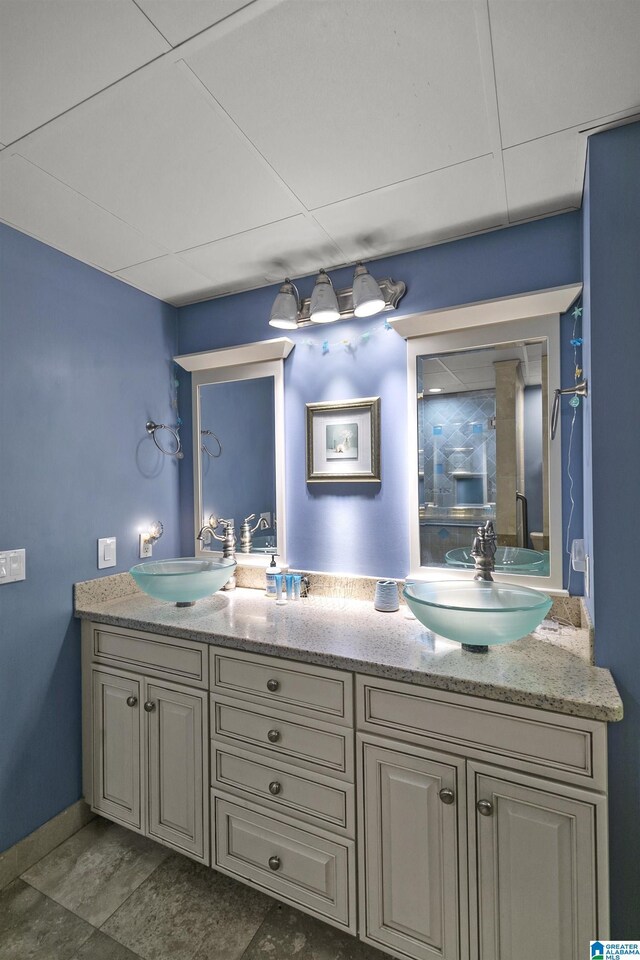 200 Asphodel Dr, Dothan, AL 36303 - full bath with double vanity and baseboards