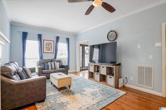 311 Hunter Hills Cir, Chelsea, AL 35043 - living area featuring ceiling fan, crown molding, baseboards, and wood finished floors