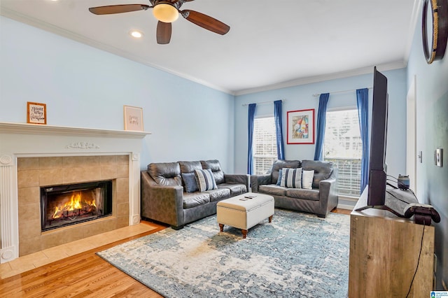 311 Hunter Hills Cir, Chelsea, AL 35043 - living area with wood finished floors, a ceiling fan, ornamental molding, a fireplace, and recessed lighting