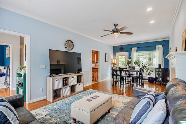311 Hunter Hills Cir, Chelsea, AL 35043 - living area with wood finished floors, ornamental molding, ceiling fan, baseboards, and recessed lighting