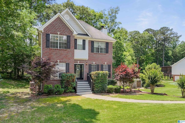 311 Hunter Hills Cir, Chelsea, AL 35043 - view of front of house featuring brick siding, a front yard, and a chimney