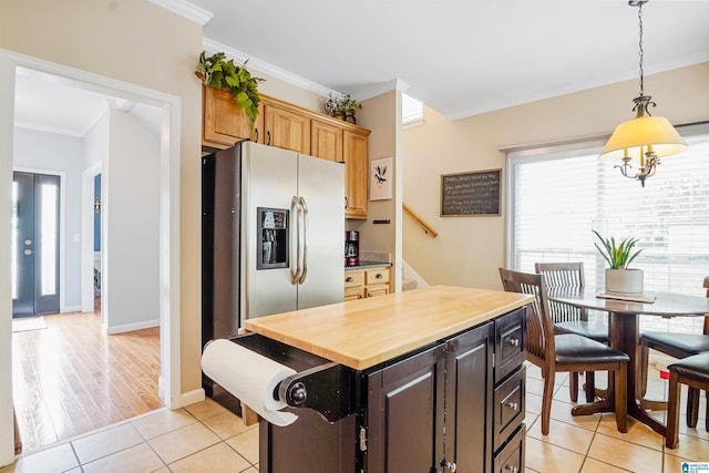 311 Hunter Hills Cir, Chelsea, AL 35043 - kitchen with stainless steel refrigerator with ice dispenser, crown molding, decorative light fixtures, healthy amount of natural light, and butcher block countertops