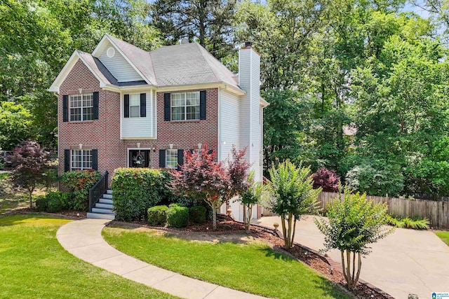 311 Hunter Hills Cir, Chelsea, AL 35043 - colonial house featuring a chimney and brick siding