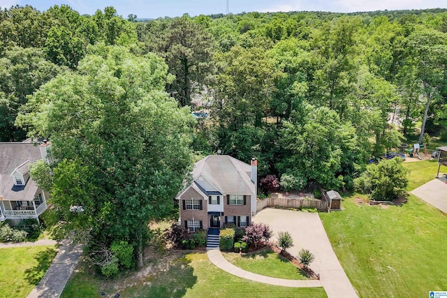 311 Hunter Hills Cir, Chelsea, AL 35043 - aerial view of property and surrounding area with a heavily wooded area