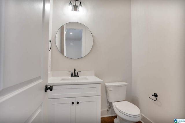 552 Village Green Way, Hoover, AL 35226 - bathroom with toilet, vanity, and baseboards