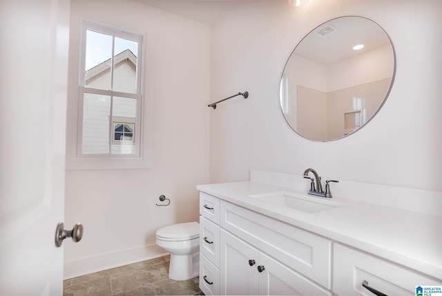 552 Village Green Way, Hoover, AL 35226 - bathroom featuring vanity, baseboards, and toilet