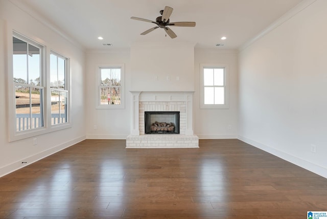 552 Village Green Way, Hoover, AL 35226 - unfurnished living room with ornamental molding, plenty of natural light, ceiling fan, a brick fireplace, and dark wood-style flooring