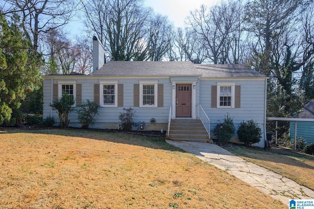 516 85th St, Birmingham, AL 35206 - view of front facade with a chimney and a front yard