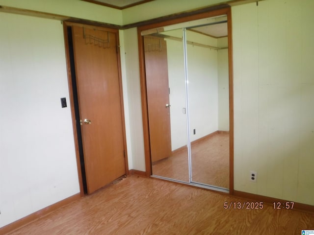 530 Sand Rock Ave, Leesburg, AL 35983 - unfurnished bedroom featuring wood finished floors and baseboards
