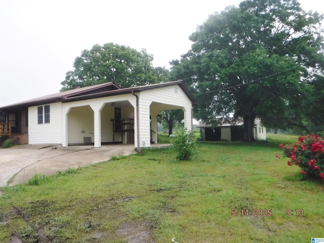 530 Sand Rock Ave, Leesburg, AL 35983 - view of front of home with a front lawn, a carport, and concrete driveway