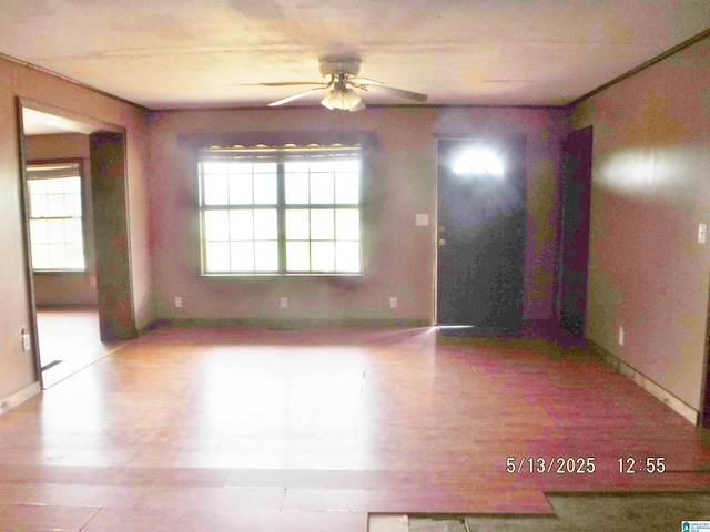 530 Sand Rock Ave, Leesburg, AL 35983 - unfurnished room with a ceiling fan, wood finished floors, and baseboards