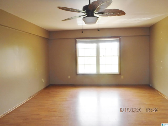 530 Sand Rock Ave, Leesburg, AL 35983 - spare room with light wood-style floors, a ceiling fan, and baseboards