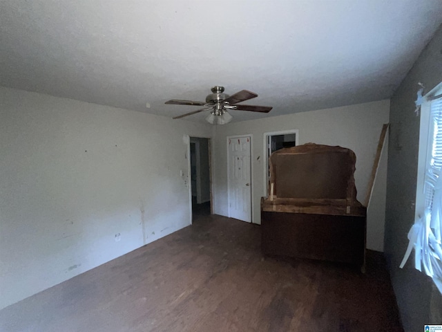 375 Little Dismal Rd, Arley, AL 35541 - unfurnished bedroom featuring wood finished floors and a ceiling fan